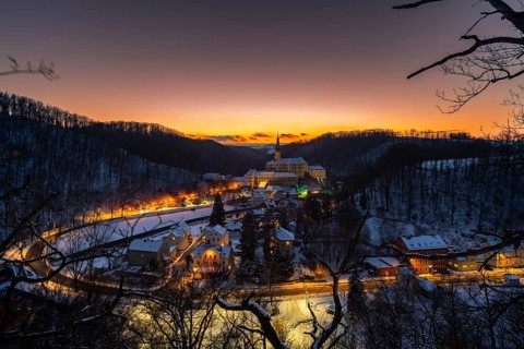 Winter evening in the Müglitz valley, impressively illuminated Weesenstein Castle at the blue hour,