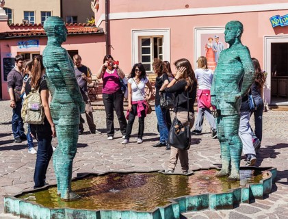PRAGUE, CZECH REPUBLIC, APRIL 28, 2012: Bizarre peeing men sculpture by David Cerny in Prague,