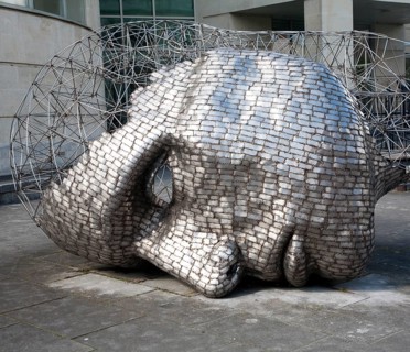 Head sculpture by artist Rick Kirby in Calne town centre, north Wiltshire, England installed in