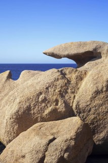 Strange rock formations and water, wind eroded boulders along the Côte de granit rose, Pink Granite