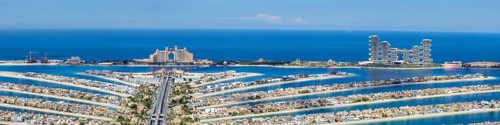 The Palm Jumeirah with Atlantis Hotels panorama artificial island from above in Dubai, United Arab