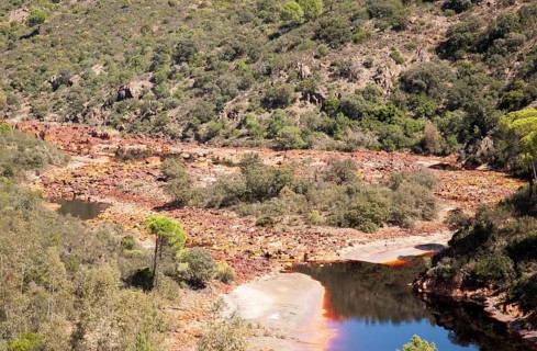 Blood red mineral laden water Rio Tinto river Minas de Riotinto mining area, Huelva province,