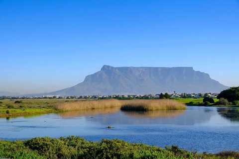 From Bloubergstrand to the silhouette of Cape Town, Cape Town, with Table Mountain, Cape Town,