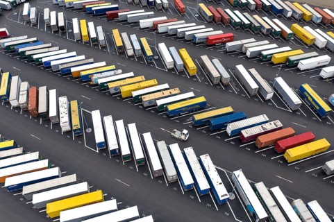 Containers and swap trailers are parked in a car park at the Tesla Gigafactory, Grünheide, 28.01