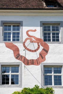 Facade with an artistically painted sundial with Roman numerals, numbers, Salem Castle, former