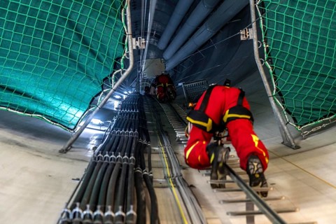 Height rescuers from the Oberhausen professional fire brigade practise abseiling from a wind