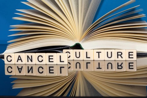 Symbolic image Cancel Culture: Letter cubes show the words Cancel Culture in front of a book