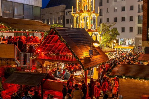 Christmas market at Roncalli Platz am Dom, in the city centre of Cologne, Sunday shopping in