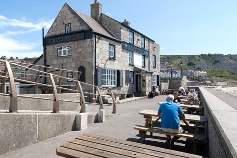 The Cove House Inn historic building at Chiswell, Isle of Portland, Dorset, England, UK