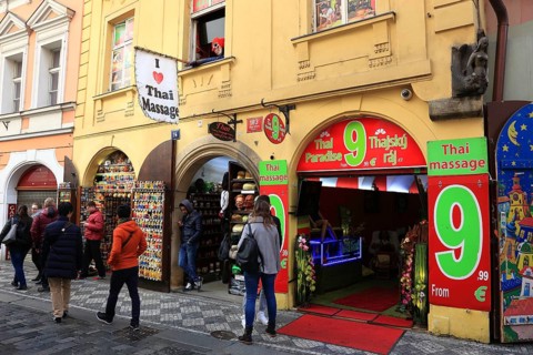 Shops, thai massage, cheap, street scene in the old town, Prague, Czech Republic, Europe