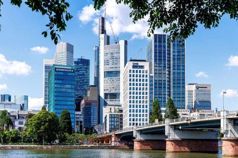 Skyline with skyscrapers in the city centre, river Main and Untermainbrücke in Frankfurt, Germany,