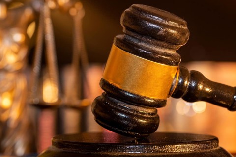Symbolic image of justice, jurisdiction, court judgement: close-up of a judge's gavel, in the