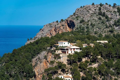 Villas on the cliffs in the north-west of the island, near Alconàsser, Serra de Tramuntana,