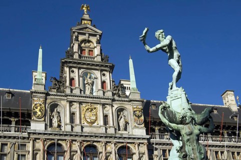 City hall and fountain statue of Silvius Brabo throwing the giant's hand at the Grote markt, Town