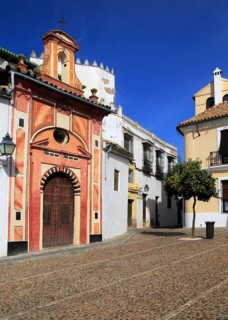 Attractive historic doorway and buildings in old inner city, Cordoba, Spain, Europe