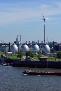 Europe, Germany, Hamburg, Köhlbrandhöft sewage treatment plant, view of the digestion towers, Elbe