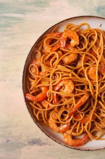 Spaghetti with king shrimps, with spices, top view, selective focus, homemade, no people