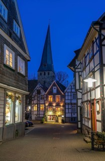 The old town of Hattingen, Johannisstraße, St. George's Church, leaning church tower, half-timbered