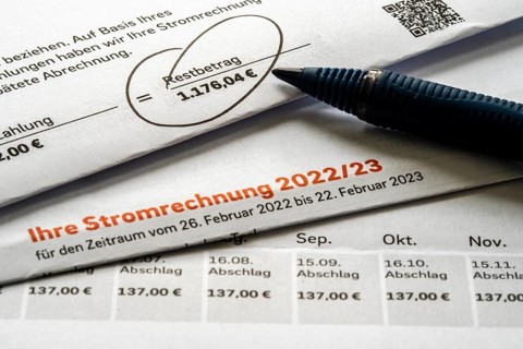 Symbolic image of electricity bill, billing of an electricity provider, additional payment due to