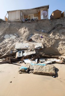 March 2018, Clifftop property collapsing due to coastal erosion after recent storm force winds,