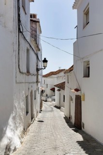 Typical white village Casares, houses, narrow alley on a hill, Route of the white villages, Malaga,