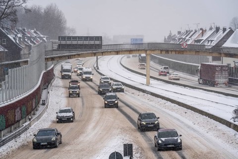 A40 motorway, onset of winter, lots of fresh snow and daytime temperatures below minus 5 degrees,