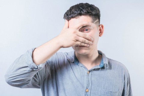 Young person with irritated eyes. People with conjunctivitis covering eye isolated. Man with eye
