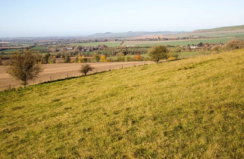 View of the Vale of Pewsey looking west from Woodborough Hill, Wilcot, Wiltshire, England, UK