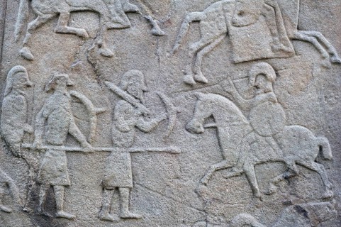 Detail of battle scene on the rear of the Aberlemno Kirkyard Cross Slab, a Pictish stone in