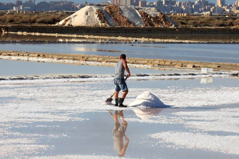 Workers in the salt pans of Trapani, Sicily, Italy, Europe