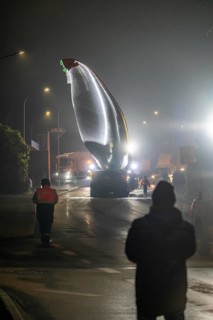 Transport of a 68 metre long, 22 tonne blade of a wind turbine, here in Breckerfeld, with a