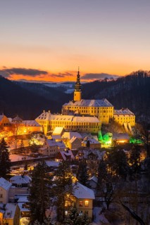 Winter evening in the Müglitz valley, impressively illuminated Weesenstein Castle at the blue hour,