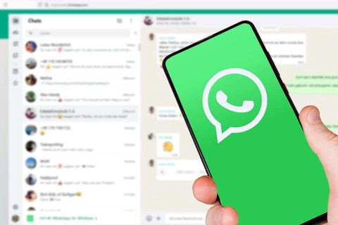 WhatsApp logo messenger app on a mobile phone smartphone and computer in Stuttgart, Germany, Europe