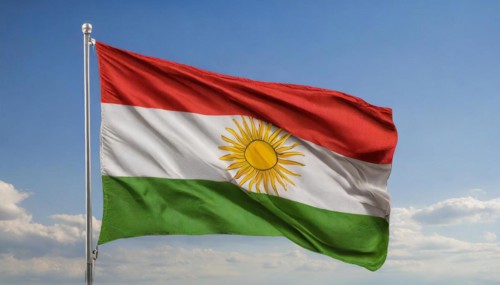 The flag of Kurdistan flutters in the wind