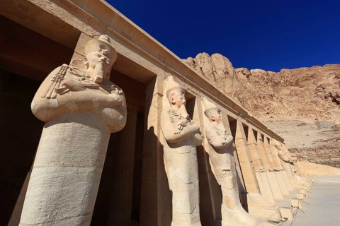 Part of the temple complex, statues of Hatshepsut at the mortuary temple of Hatshepsut, Hatshepsut