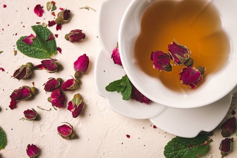 Cup of tea, damask rose, pink tea, close-up