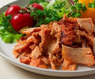 Gyros, chicken, with vegetables on plates, disassembled shawarma, fast food, appetizer, cooking