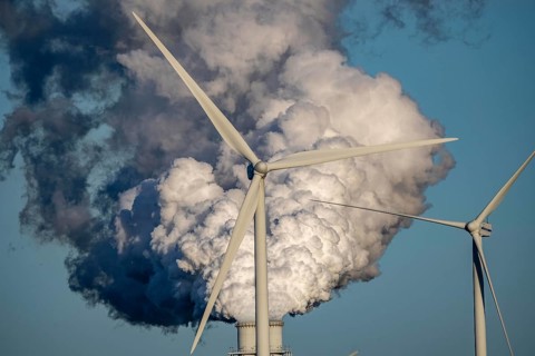 Chimneys, smoke plume of the RWE coal-fired power plant Eemshavencentrale, wind power plant, in the