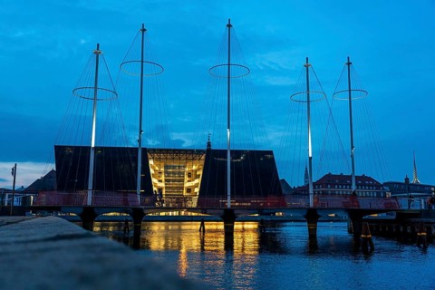 Cyclists on the Cirkelbroen cycle and pedestrian bridge, over the harbour, in the Christianshavens