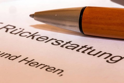 Symbolic image Application for reimbursement: close-up of a cover letter
