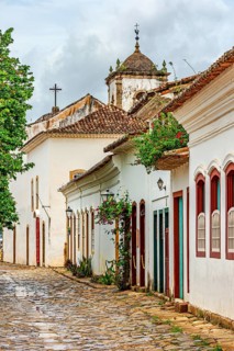 Typical street in the historic city of Paraty with its houses and stone pavement, Paraty, Rio de