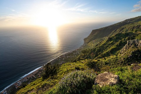 Evening mood, green coastal landscape on a steep cliff, sea and coast, viewpoint Miradouro da