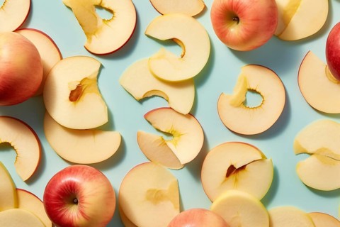 Top view of apples fruits and slices on blue background. KI generiert, generiert AI generated