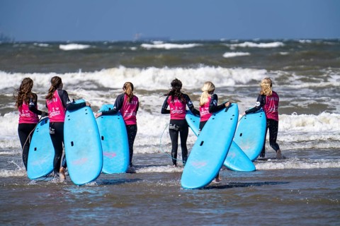 Course for surfers, surfing beginners, on the beach of Scheveningen, Netherlands