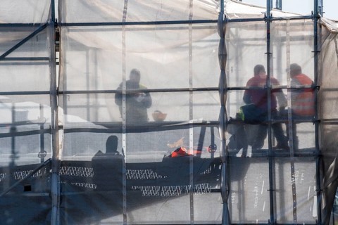 Construction site, scaffolding, work on scaffolding, lunch break, bridge piers Germany