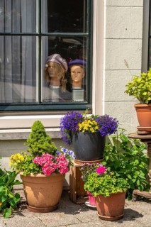 Decoration in and in front of a house in the historic centre of Amsterdam, Sint Antoniesluis,