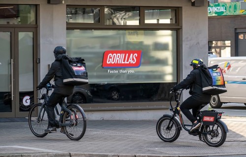 Bicycle courier from the fast delivery service Gorillas, delivers groceries, currently in over 20