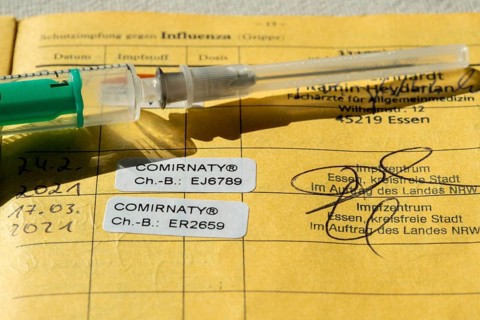 Vaccination booklet, proof of double vaccination with the Corona vaccine from BioNTEch/Pfizer,