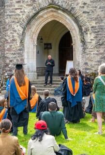 Satish Kumar speaking at graduation event, Schumacher College, Dartington Hall estate, Totnes,