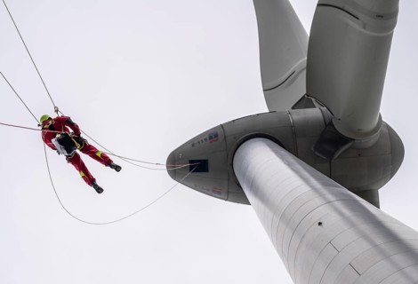 Height rescuers from the Oberhausen fire brigade practise abseiling from a wind turbine from a